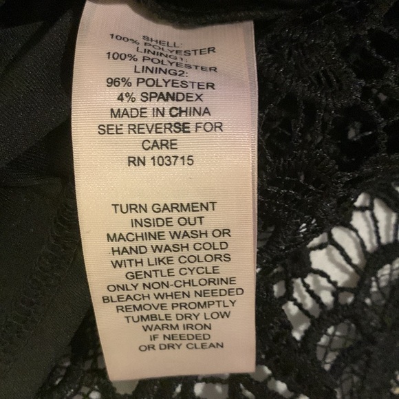 Exquisite black, lace blouse over a black camisole. - Picture 5 of 6